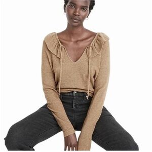 Pre-owned and in great condition Madewell tie-nexk ruffle pullover sweate. xsm